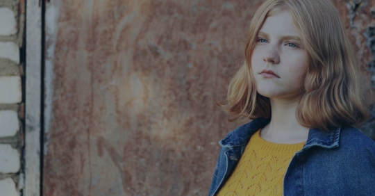 sad girl looking into the distance