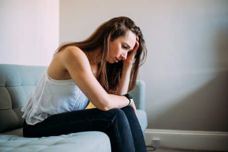 Woman upset recalling childhood trauma
