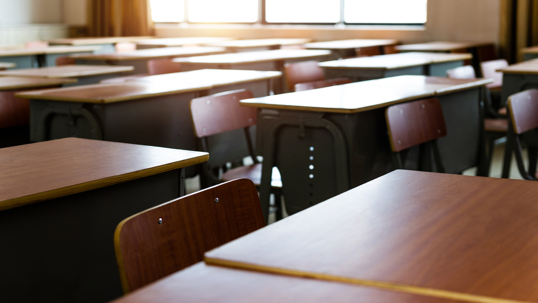 Classroom full of empty chairs