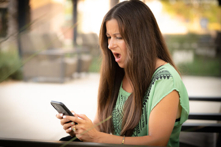 woman getting inappropriate text in workplace